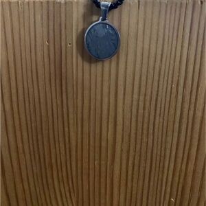 Patrick Adair circular
Meteorite Necklace
Pendant.